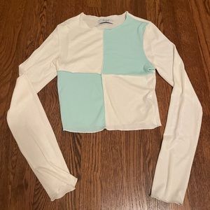 white and blue long sleeve